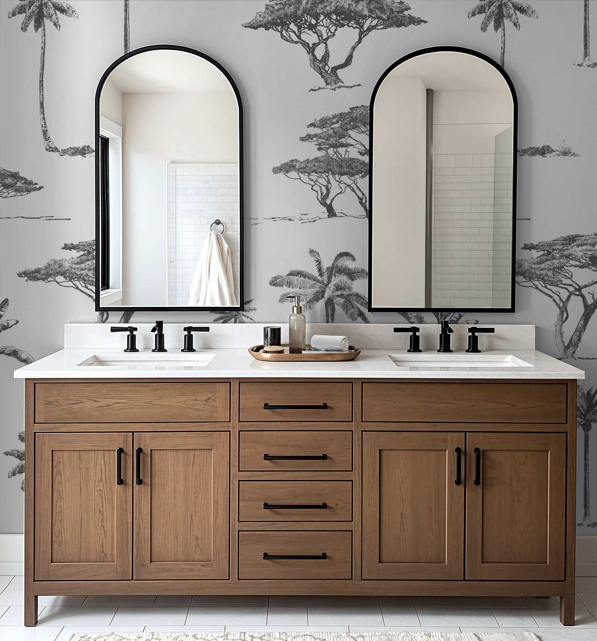 Monochrome tree sketch wallpaper in elegant bathroom with wooden vanity.