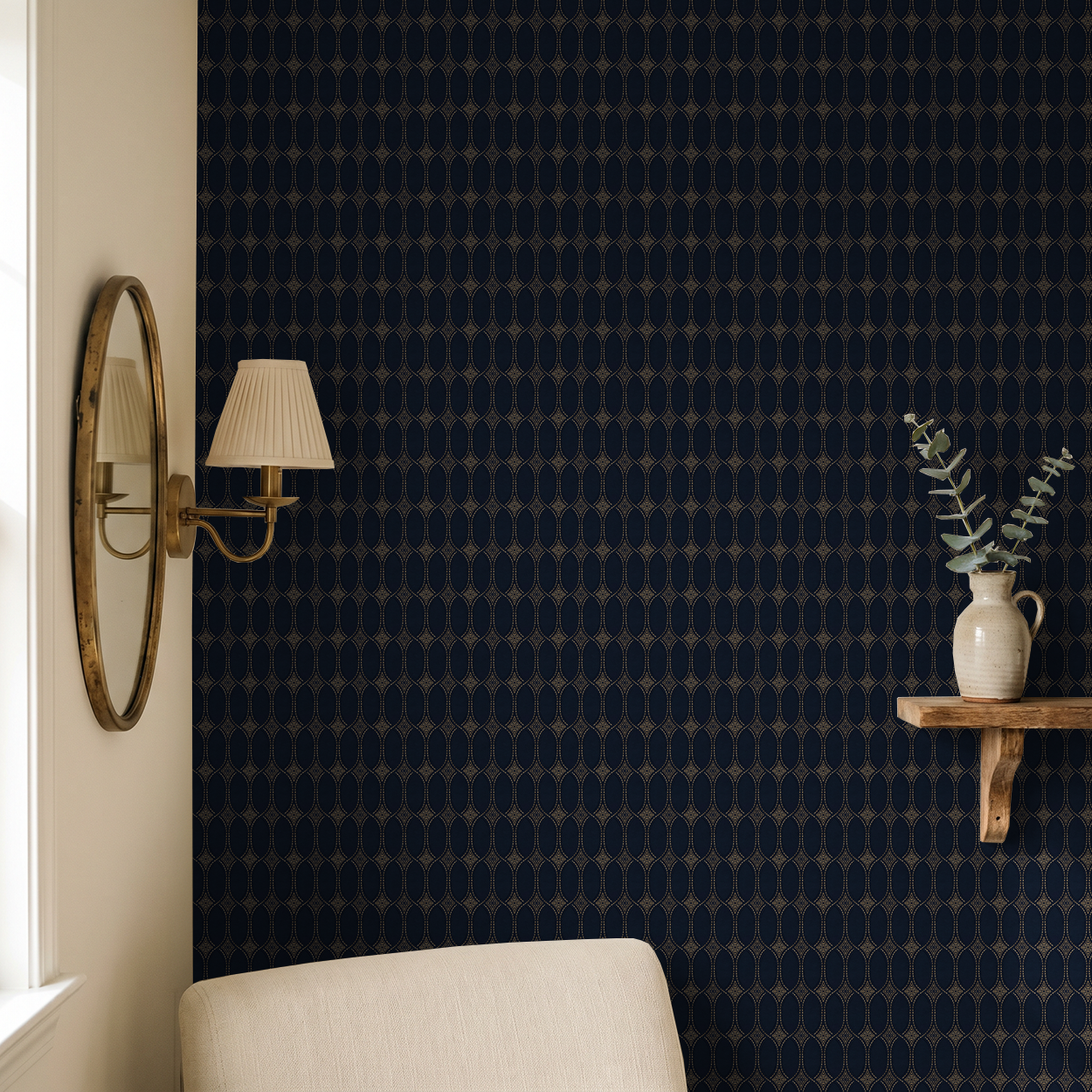 Navy and gold geometric wallpaper in elegant living room with mirror and shelf decor.