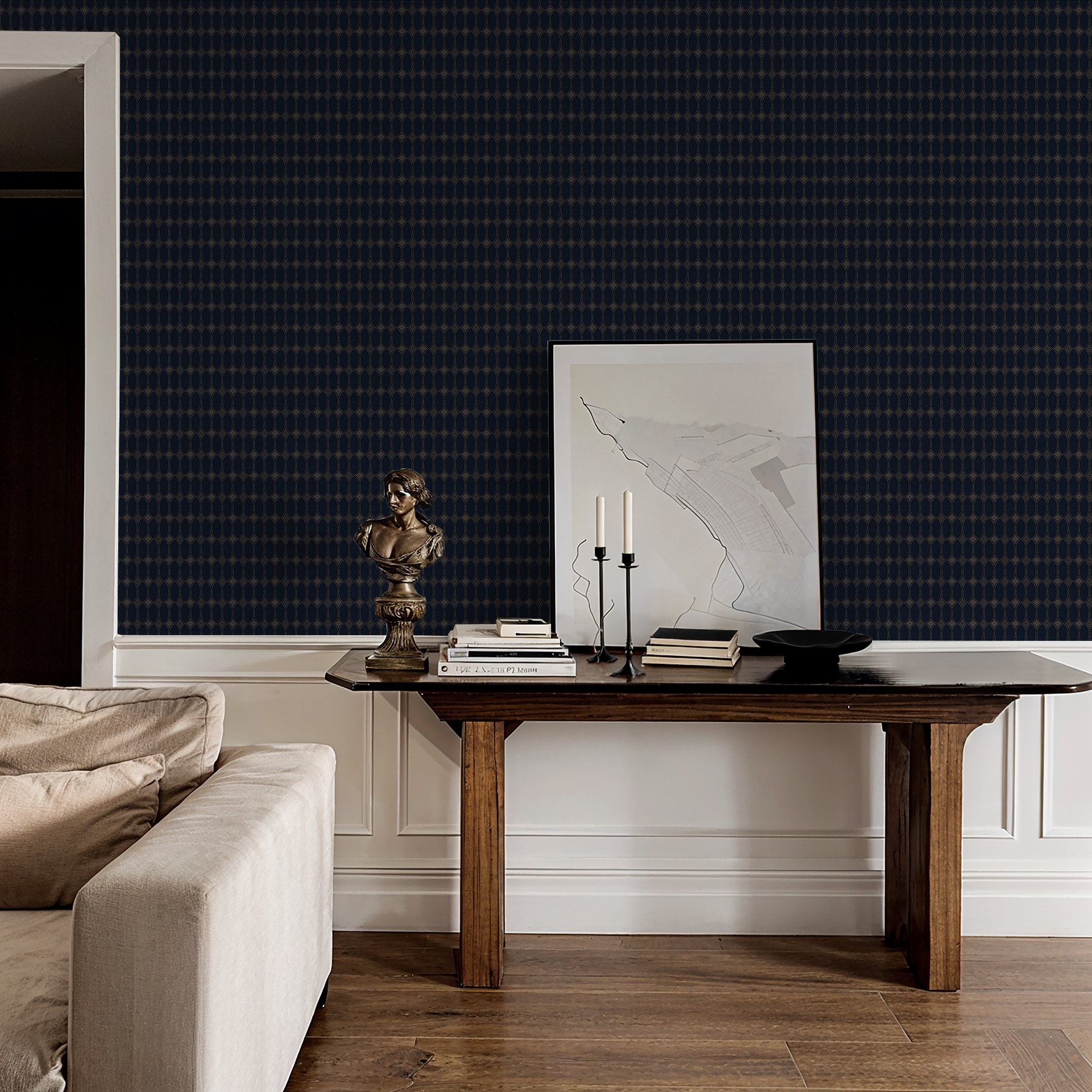 Navy and gold geometric wallpaper in elegant living room with wooden table and decor.