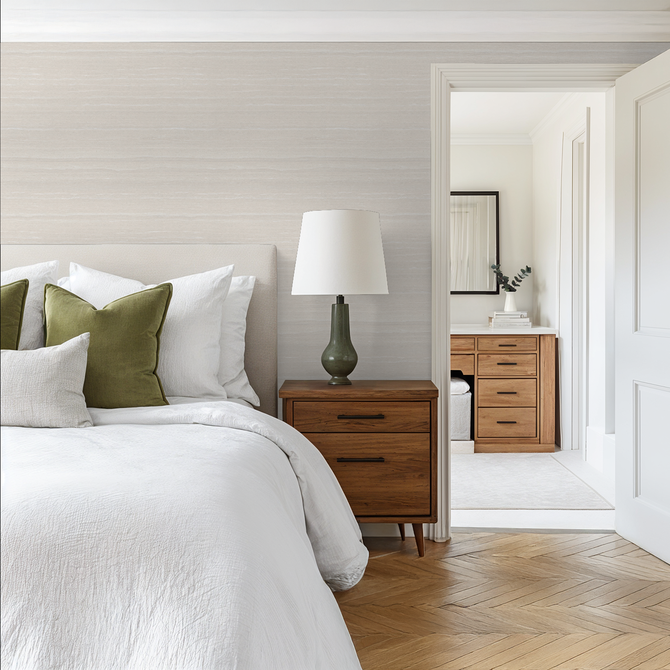 Neutral textured wallpaper in a minimalist bedroom with wooden furniture and green accents.