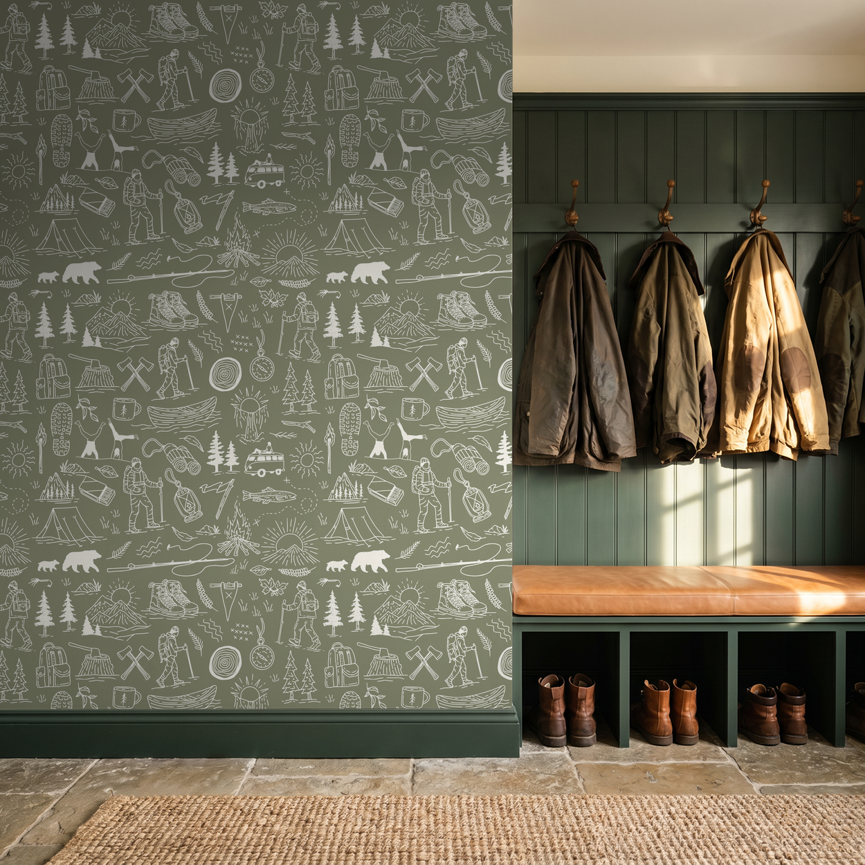Olive-green wallpaper with white camping motifs in rustic entryway.
