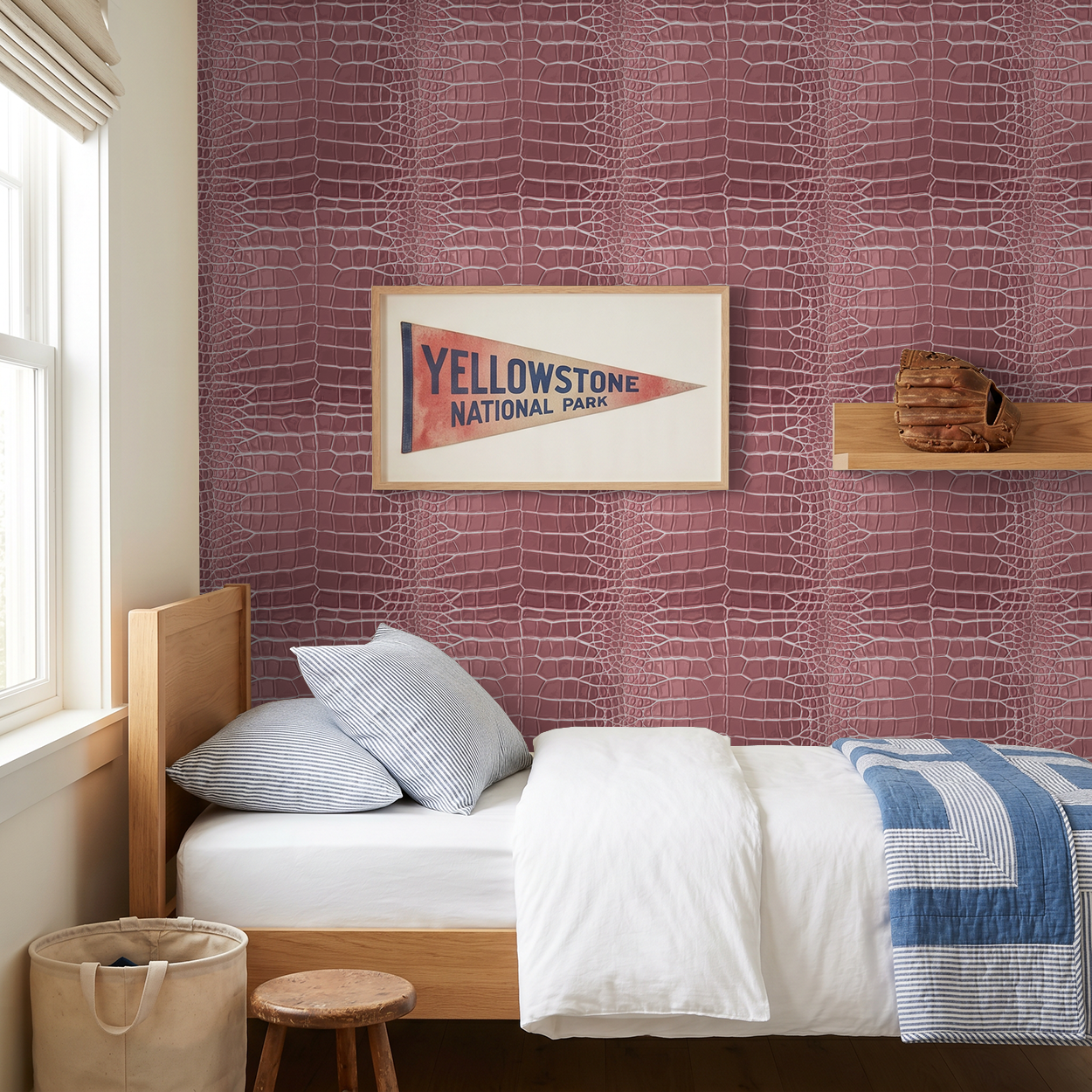 Pink crocodile-textured wallpaper in a cozy bedroom with wooden bed and framed art.