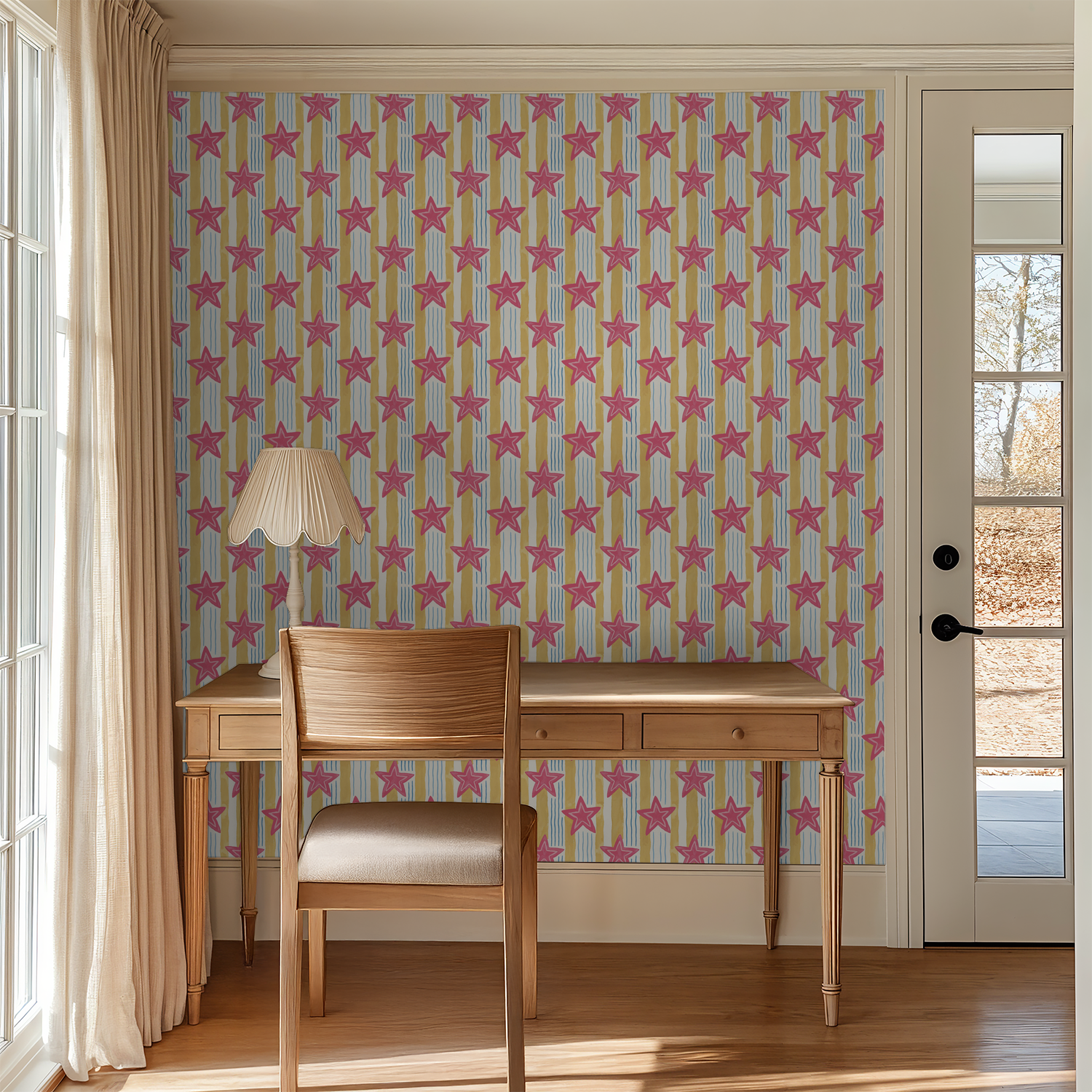 Pink star wallpaper with yellow and blue stripes in a bright study room.