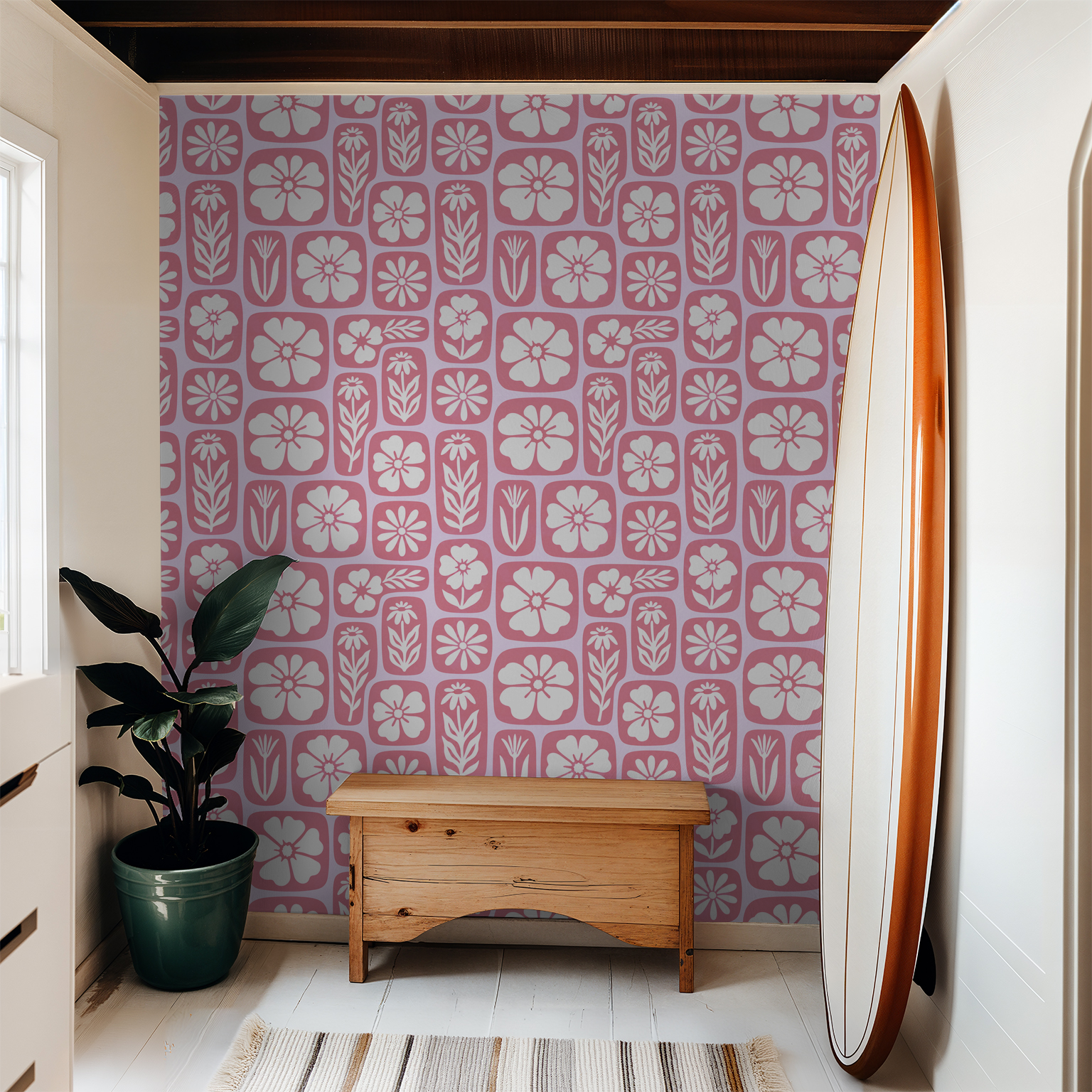 Retro floral pink and white wallpaper in cozy room with wooden bench and plant.
