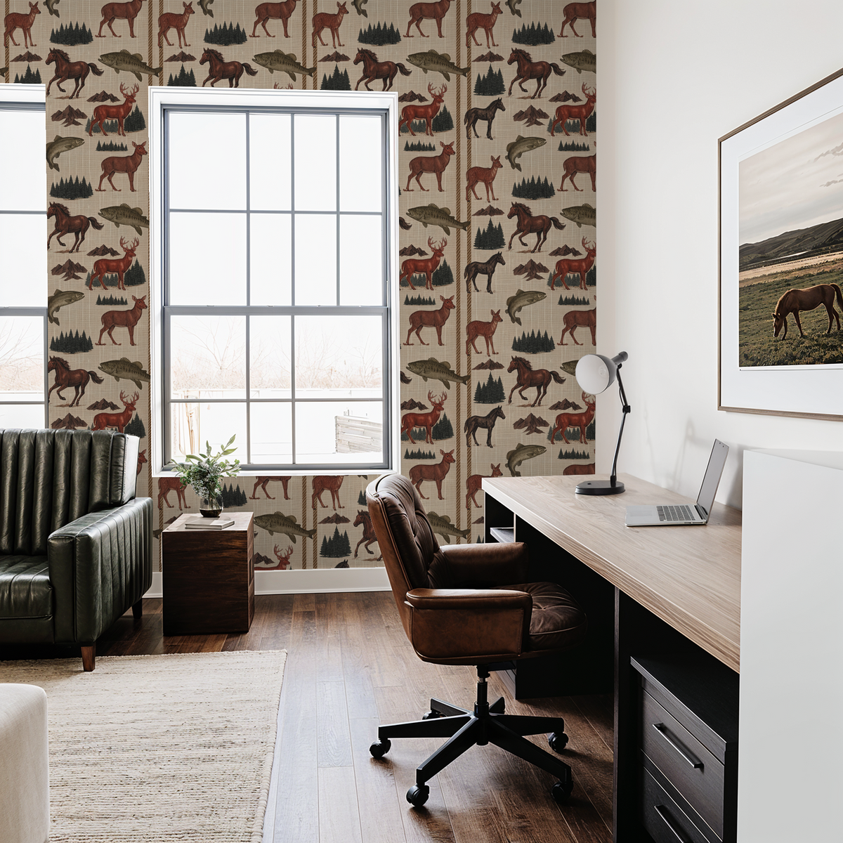 Rustic wildlife wallpaper with deer, horses, and fish in home office setting.