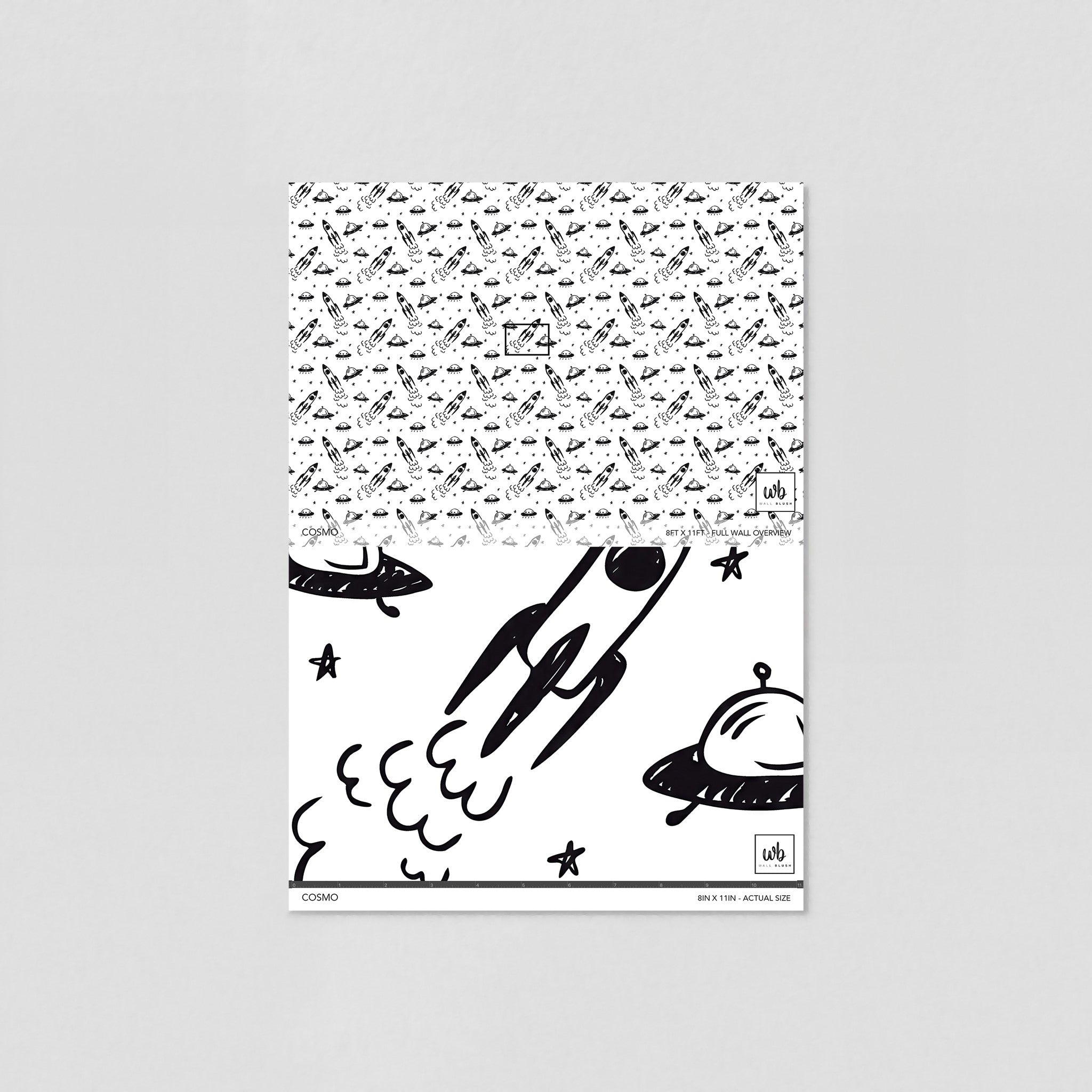 "Wall Blush's Cosmo Wallpaper sample for children's room displaying playful space-themed design."