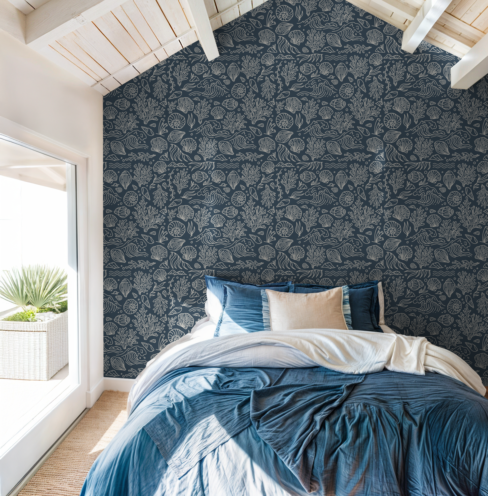 Slate blue wallpaper with white oceanic patterns in a cozy bedroom.