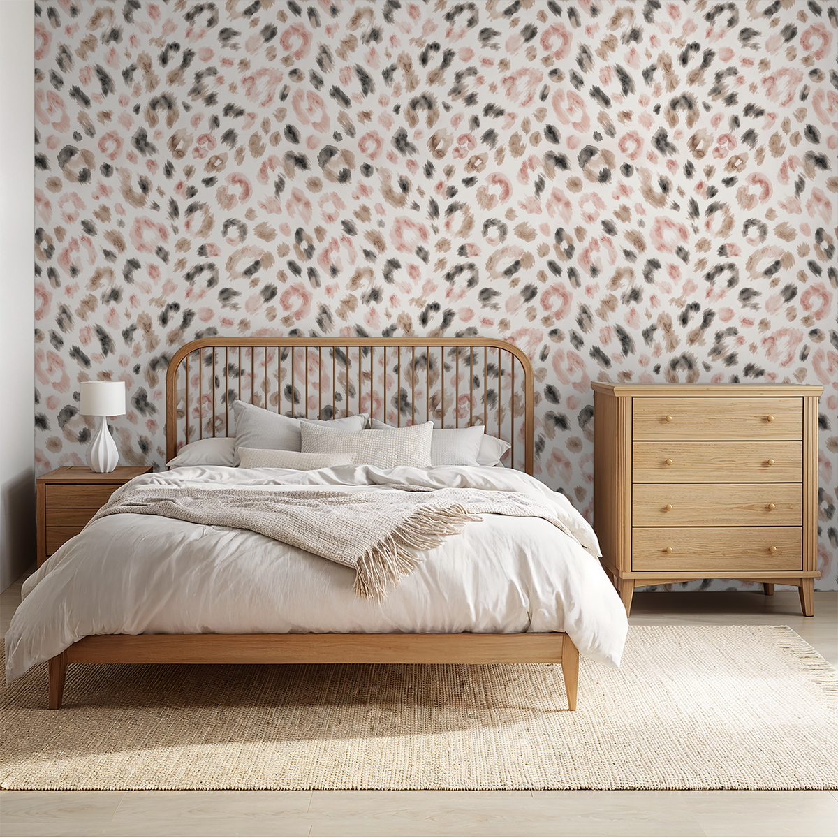 Soft Spot cheetah print wallpaper in muted browns and blush in a cozy bedroom setting.