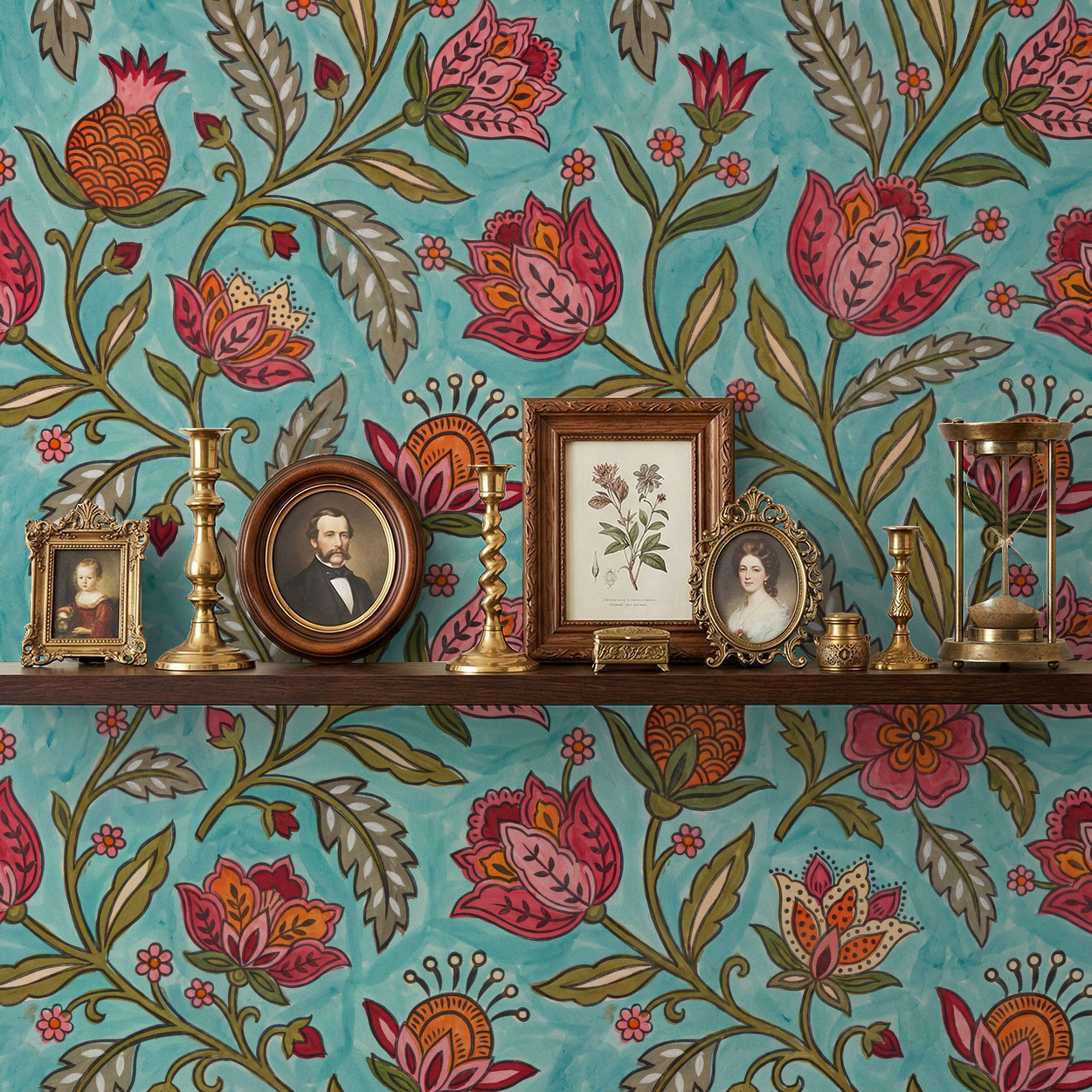 Vibrant floral wallpaper with red and orange motifs on teal background, vintage decor.