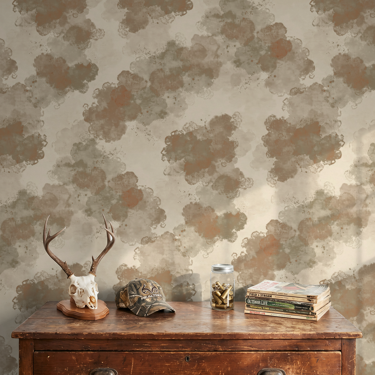 Warm taupe abstract watercolor wallpaper in rustic setting with antler decor.