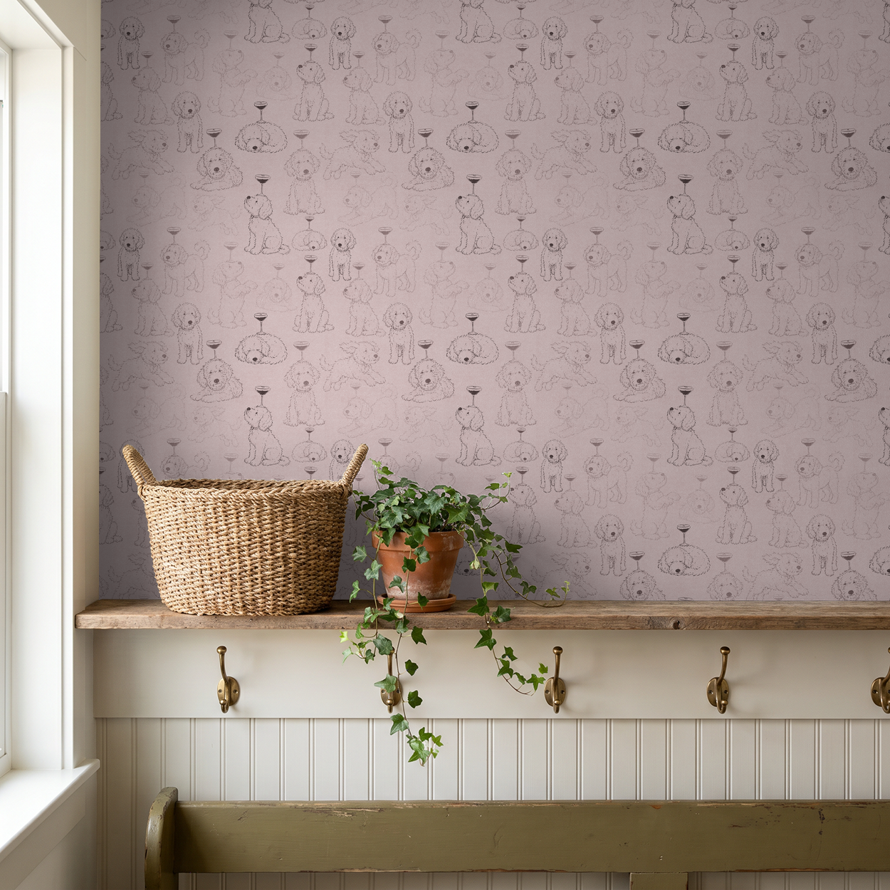 Whimsical dog wallpaper with coupe glasses on soft pink background in cozy room.
