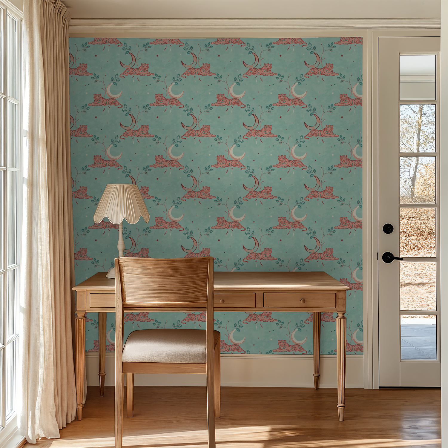 Whimsical tiger and moon wallpaper in aqua with coral accents in a serene study room.