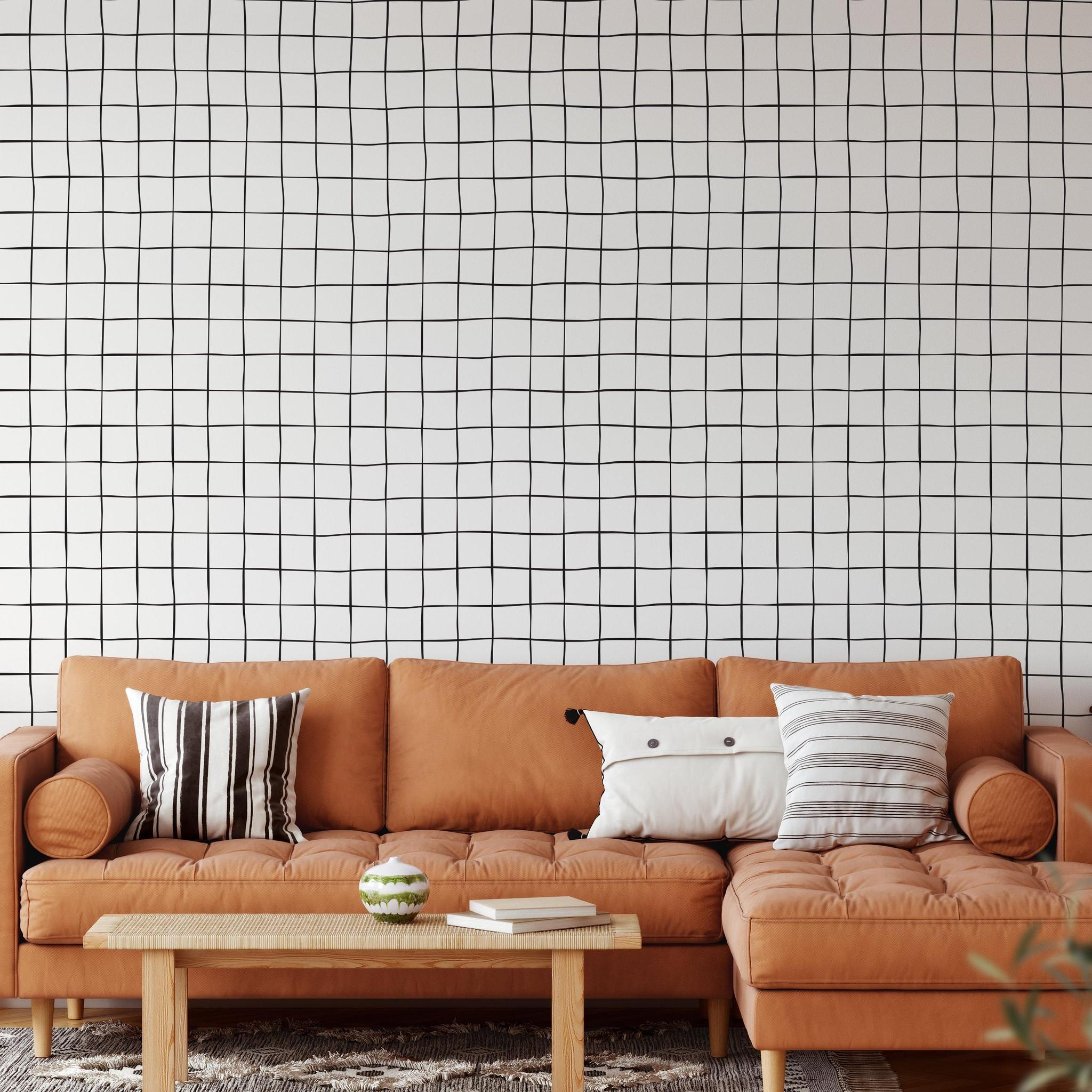 Buxton Wallpaper by Wall Blush SG02 in a stylish living room highlighting the wall's design and texture.
