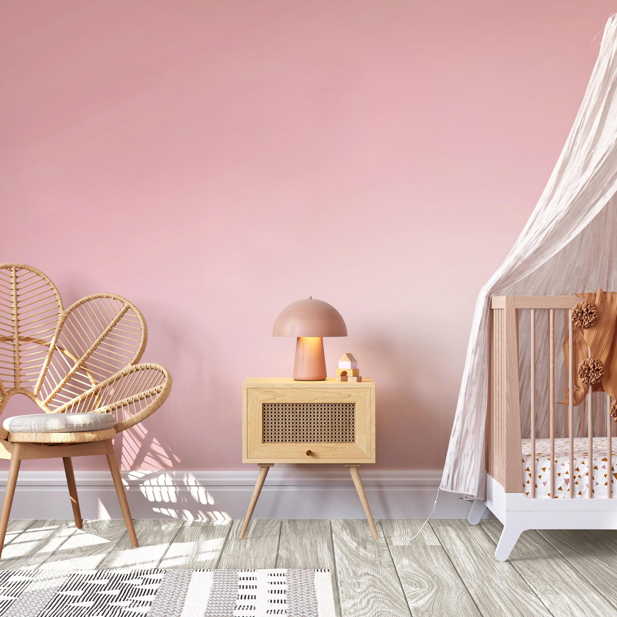 Pretty in Pink Wallpaper from The Clements Crew Line in a Stylish Nursery Room, Emphasizing Soft Wall Hue
