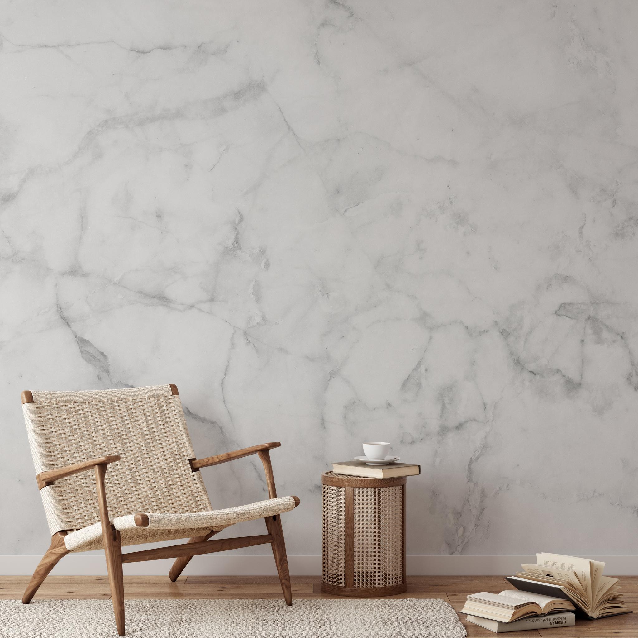 "Wall Blush Petra Wallpaper in minimalist living room with stylish armchair and side table focus on decor."