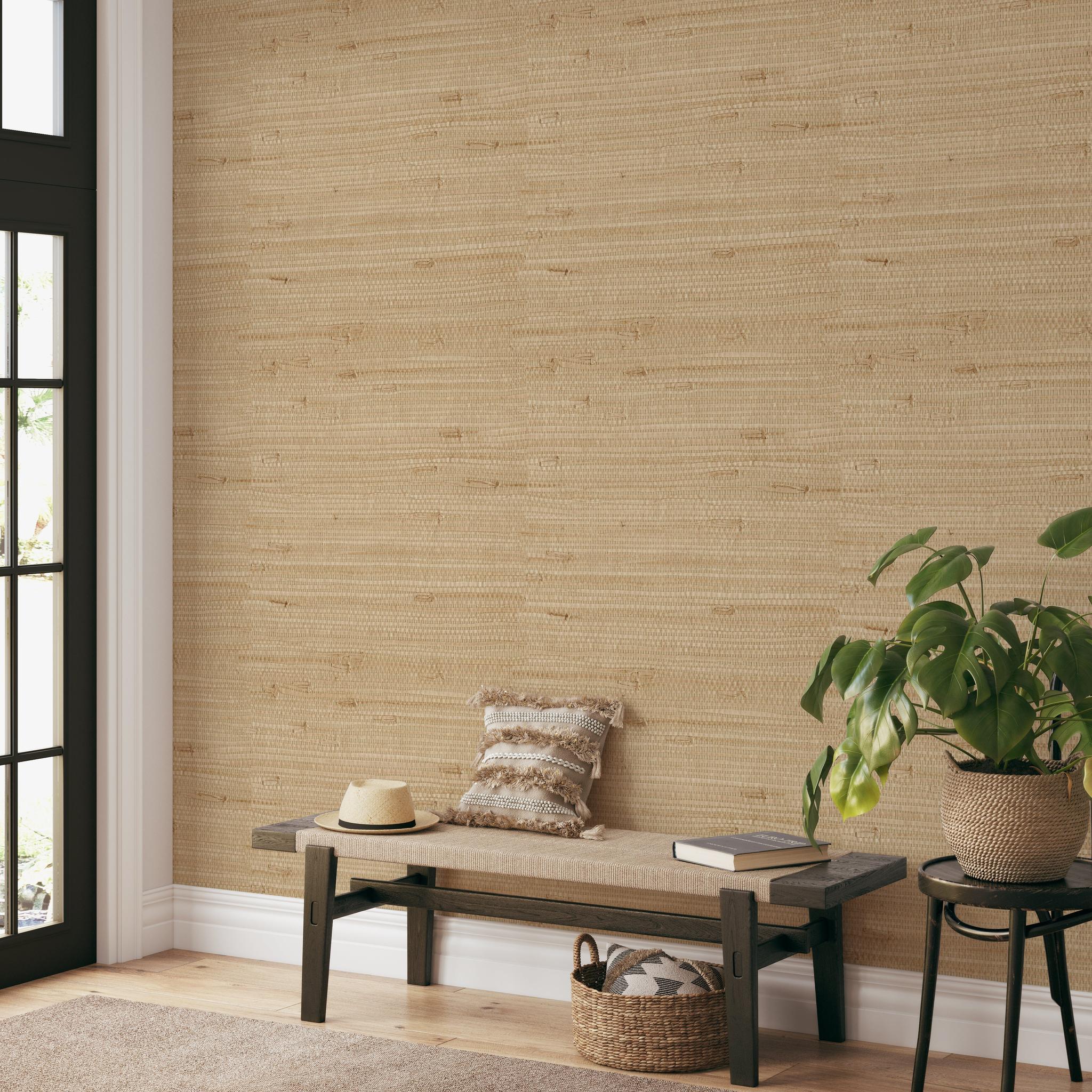 "Wall Blush Ida Wallpaper featured in a stylish living room, with modern decor and cozy bench seating."